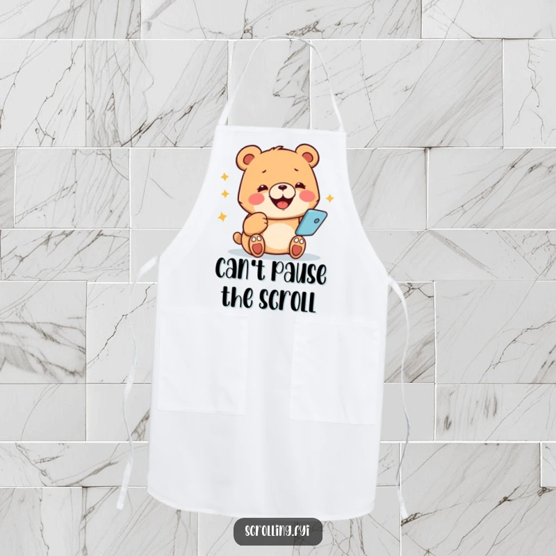 Funny bear apron, beaming and tapping on a phone, blending cooking with digital distraction humorously.