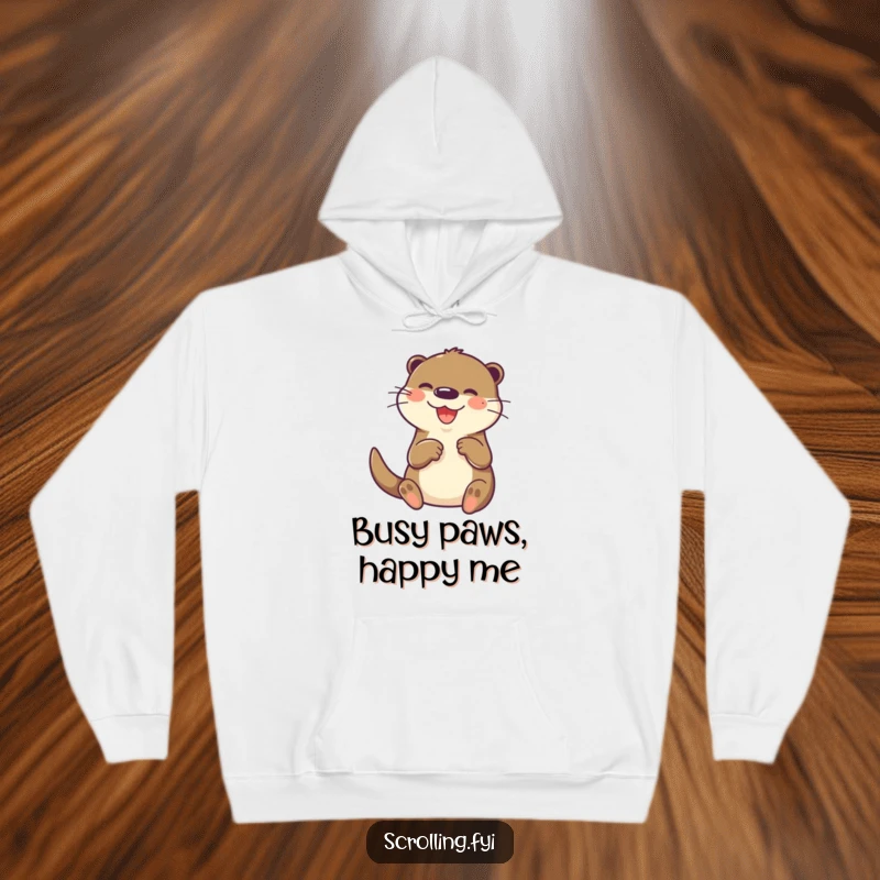 Funny otter hoodie, joyfully and rapidly tapping on a small screen with its paw, providing cozy tech humor.