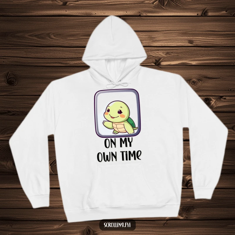 Funny Turtle Swiping Display Hoodie: A warm and soft hoodie featuring a smiling turtle slowly swiping on a digital screen, perfect for relaxed humor.