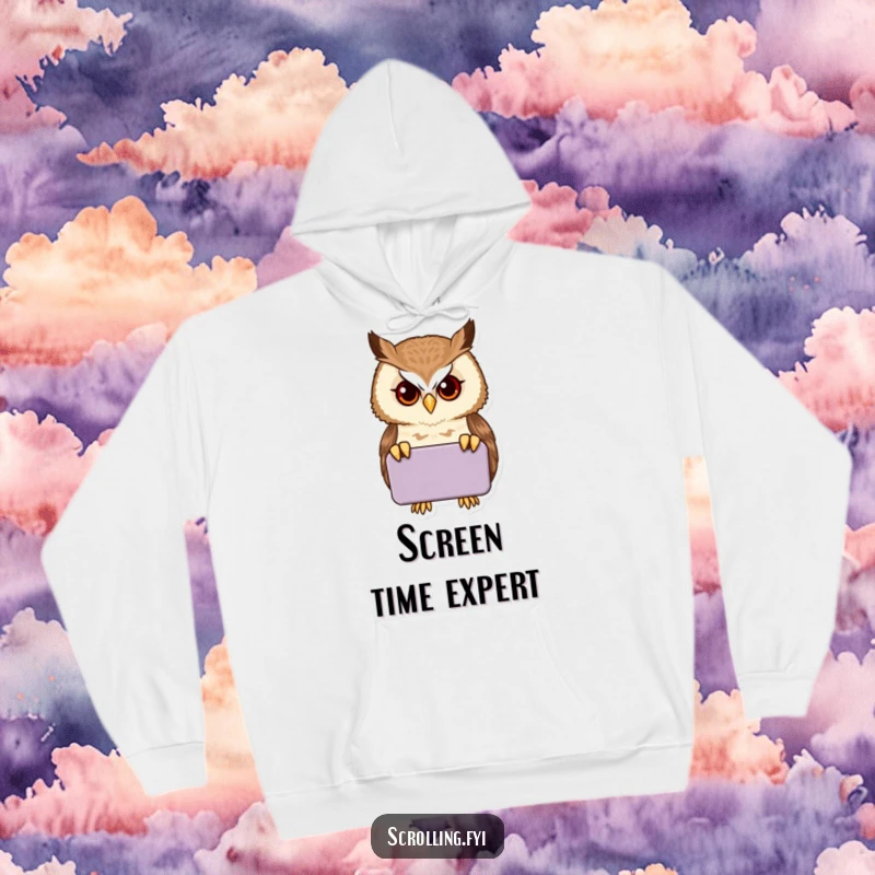Funny proud owl peering intently into a handheld device, featured on a comfortable and humorous hoodie.