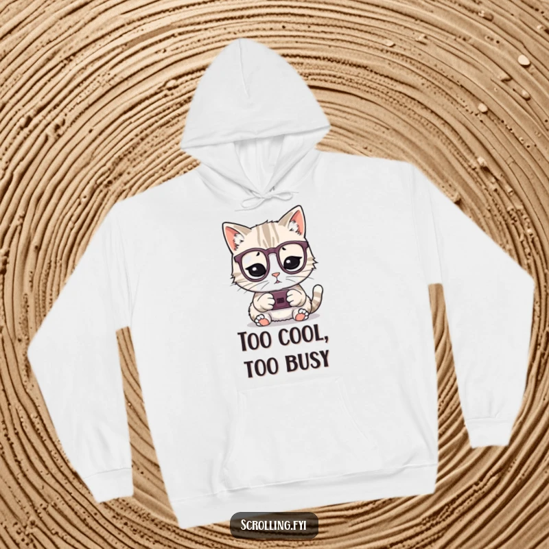 Funny cozy hoodie with a playful cat wearing glasses, engrossed in a small device, a great funny gift.
