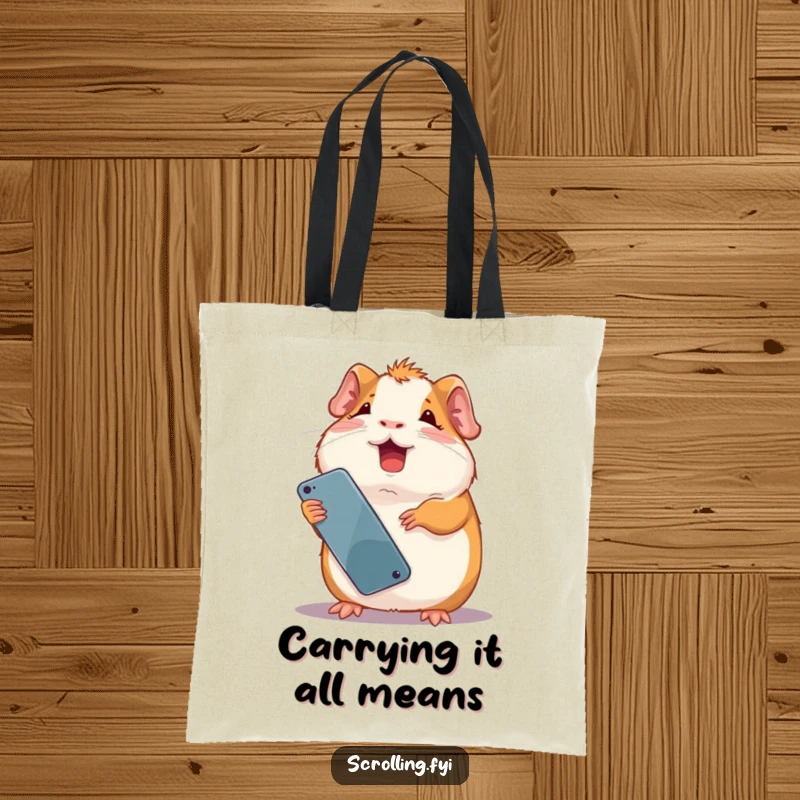 Funny giggling guinea pig attempting to use a phone upside down, radiating amusement. Ideal funny tote bag.